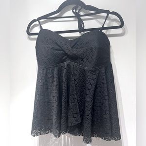 Tankini top is sheer/opens at the bottom of top Xl